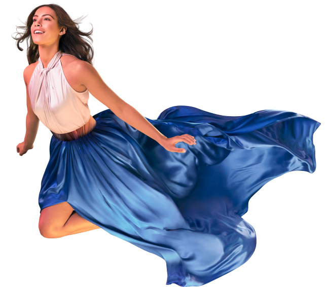 Woman in blue dress floating in mid air amongst the clouds